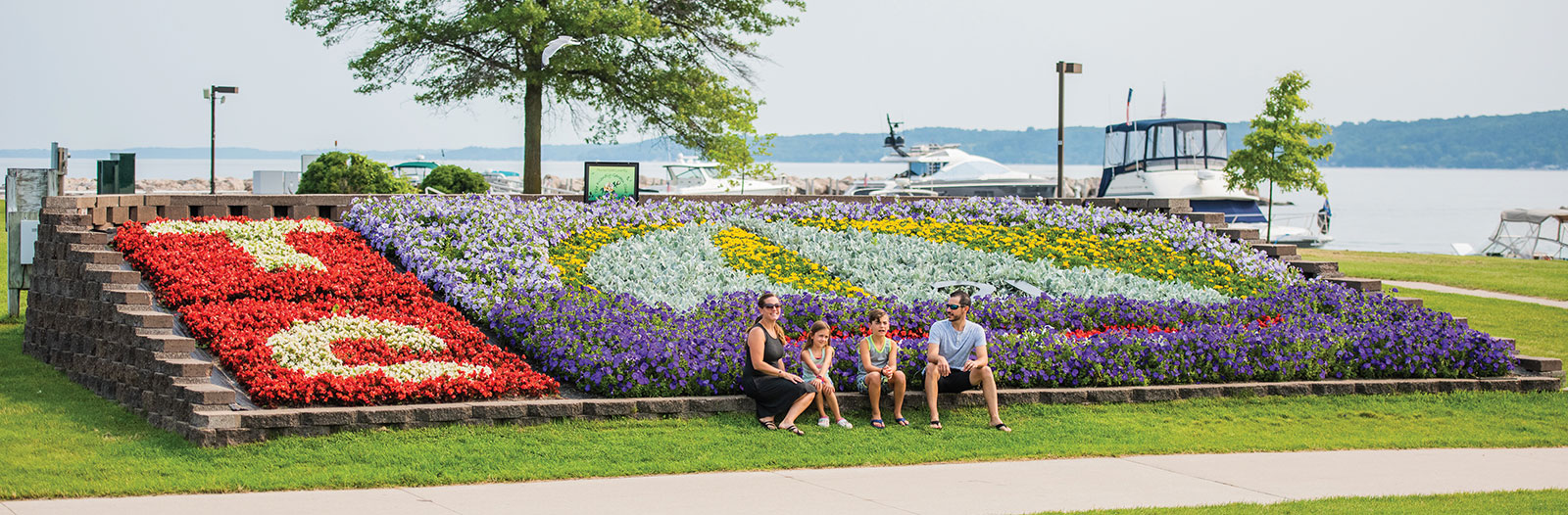 Traverse City Mi Logo-Garden-in-Open-Space-Park