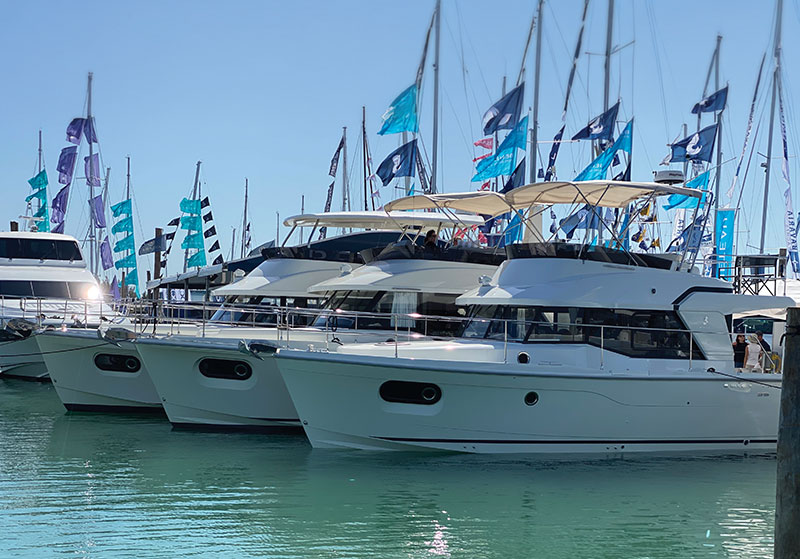 Three sizes of trawlers at the Miami Boat Show