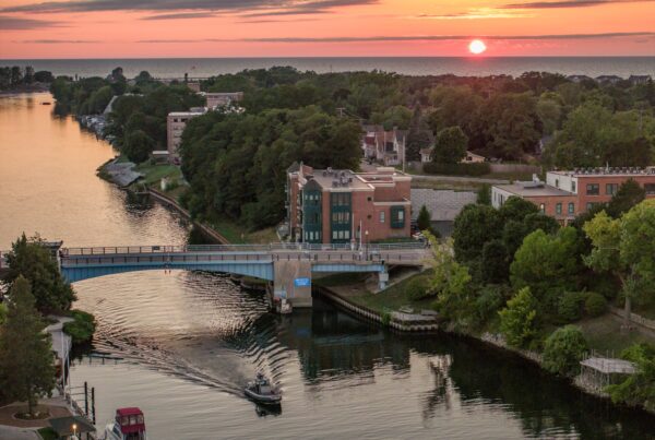 Aerial view of sunset over the Manistee River in Manistee, Michigan.