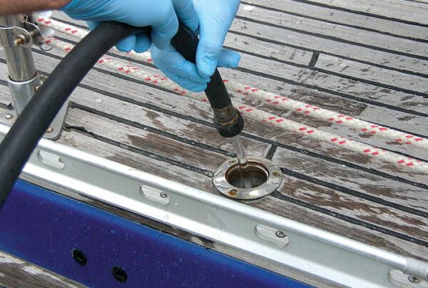 Flushing a holding tank